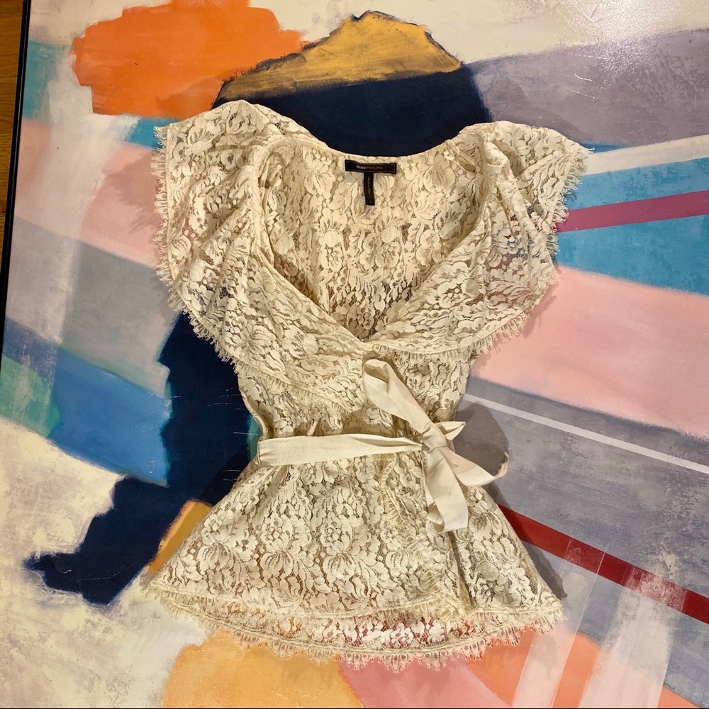 BCBG cream lace top with ribbon.